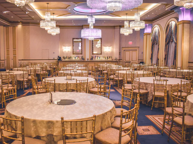 A banqueting hall laid for an event